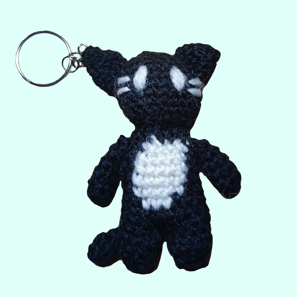 black patterned belly cat keychain.